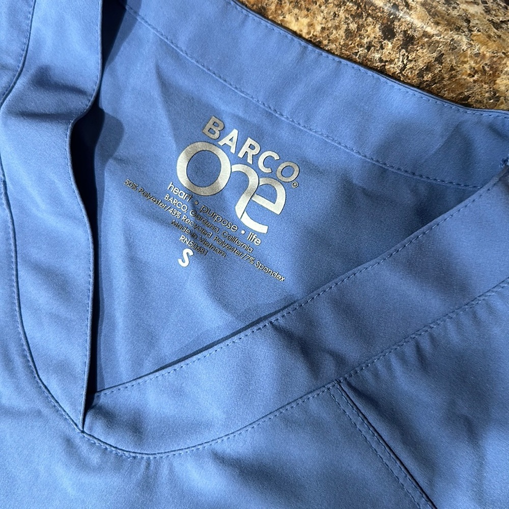 Women’s scrub top set. Colors match lighting is just different